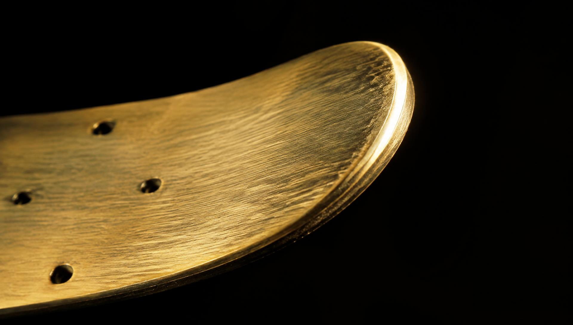Hand-finished brass kicktail